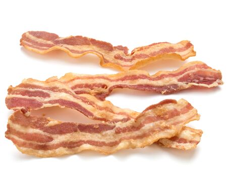 cooked crispy slices of bacon isolated on white background
