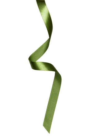 Shiny satin ribbon in green color isolated on white background close upの写真素材