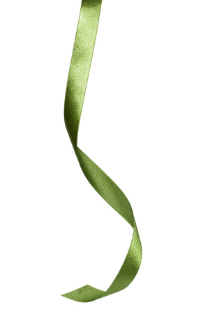 Shiny satin ribbon in green color isolated on white background close up. Ribbon image for decoration design.の写真素材