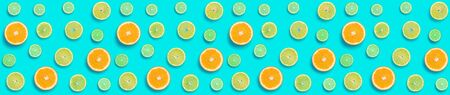 Creative layout made of colorful tropical fruits isolated on blue background. Minimal summer exotic...