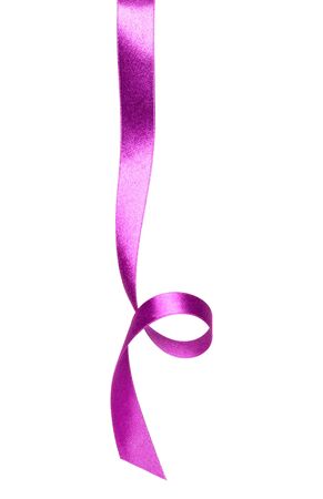 Shiny satin ribbon in lilac color isolated on white background close up. Ribbon image for decoration design.の写真素材