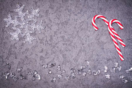 Christmas greeting card. Noel festive background. New year symbol. Christmas candy cone.. Copy space to your text.の写真素材