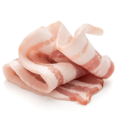 sliced bacon isolated on white background cutoutの写真素材