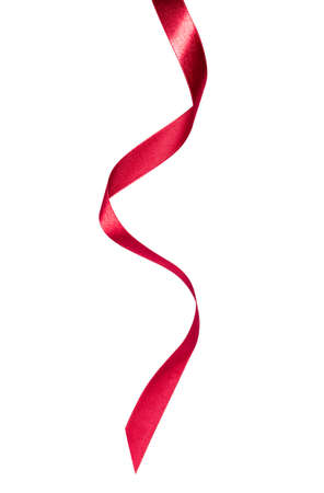 Shiny satin ribbon in red color isolated on white background close upの写真素材
