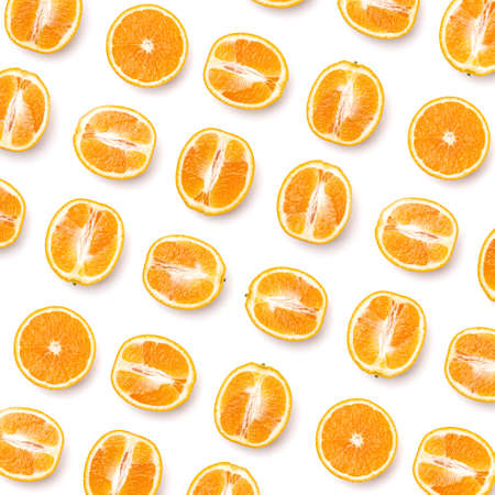 pattern of orange fruit halves. Orange fruit isolated on white background. Food background. Flat...