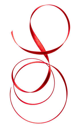 Shiny satin ribbon in red color isolated on white background close up. Ribbon image for decoration design.の写真素材