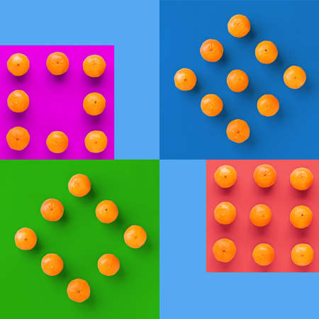 Fruit pattern of fresh orange tangerine or mandarin on colorful background. Flat lay, top view. Pop...