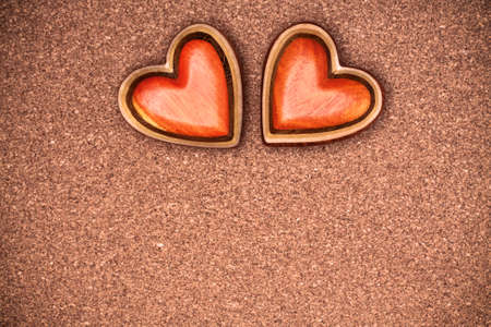 Two wooden hearts on rustic wood background. Valentines days concept.  Love symbol. Greeting card...