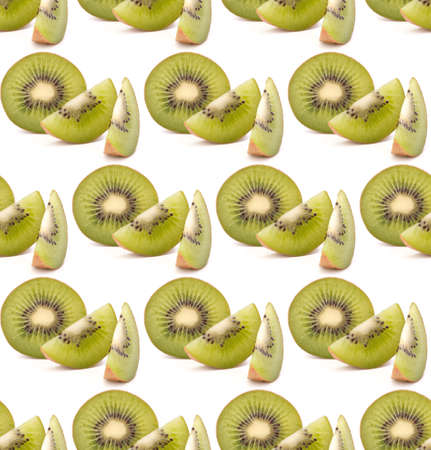 Kiwi fruit sliced segments isolated on white background cutout. Seamless food pattern.の写真素材