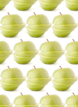 Green sliced apple isolated on white background cutout. Seamless food pattern.の写真素材