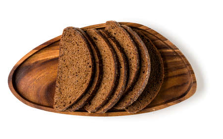 Rye bread slices isolated over white background. Flat lay, top view.