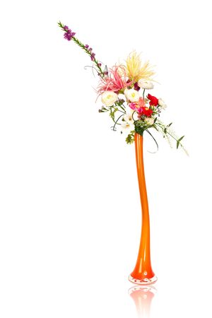Spring floral bouquet in a orange vaseの写真素材