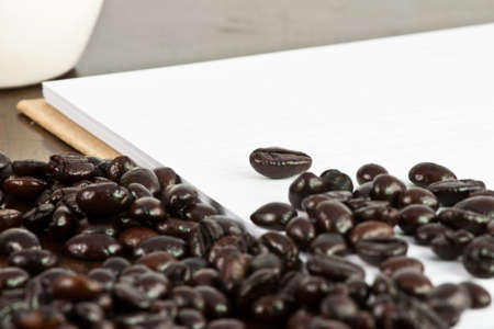Coffee grain on note book paperの写真素材