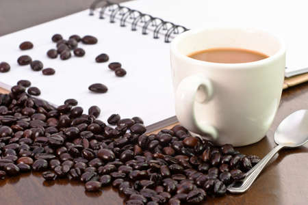 Cup of coffee and grain coffeeの写真素材