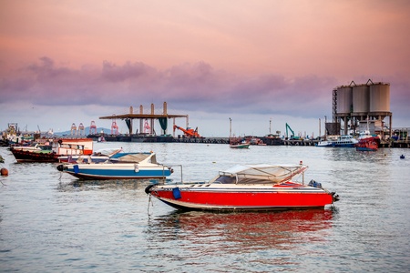 Fast boat in sea, post of shipment backgroundの写真素材
