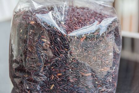 Ricberry in bag on glass tableの写真素材