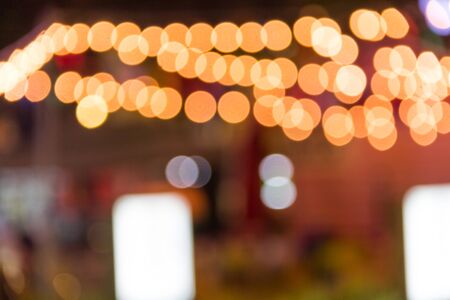 Defocused abstract texture bokeh background on night city lighting