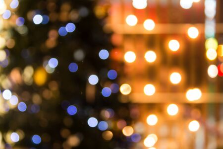Defocused abstract texture bokeh background on night city lightingの写真素材
