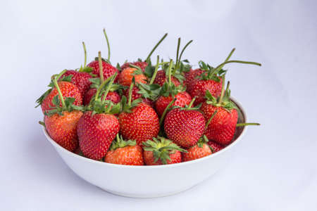Fresh red strawberry clean fruit on isolated backgroundの写真素材