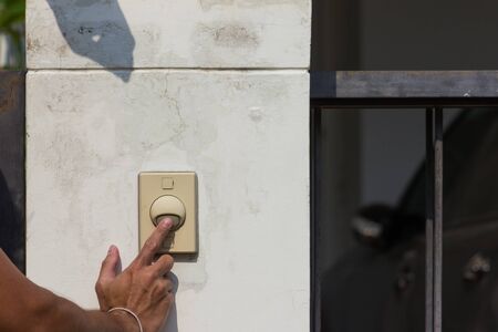 pushing ring house on wall frout side fenceの写真素材