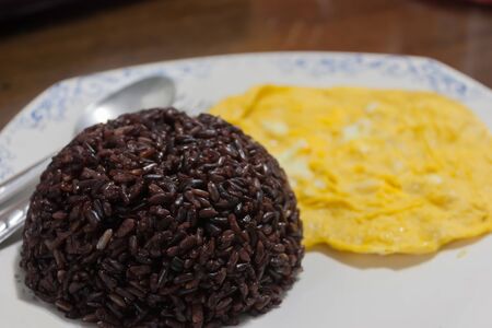 riceberry and omelette isolated on white background food thailandの写真素材