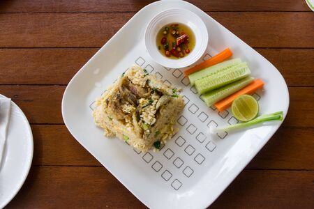 fried rice with trichogaster pectoralis thai food on restaurantの写真素材