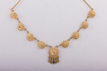 beautiful gold belt isolated white background accesory weddingの写真素材