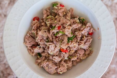 delicious fresh tuna mixed Thia food on white bowlの写真素材