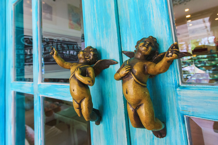 door handle with cupid shape decorated at resturantの写真素材