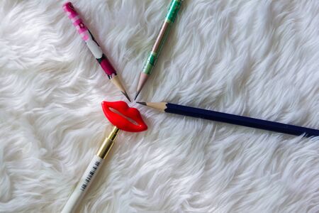 pencil put sequence on white carpetの写真素材