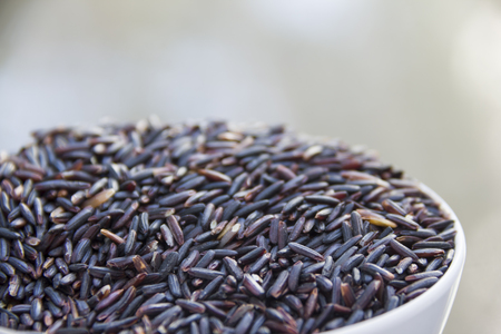 rice-berry mixed rice in white bowl with blur backgroundの写真素材