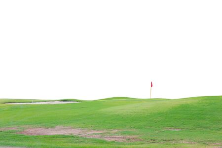 green golf mound with lush of grass and holes have red flags isolated with white backgroundの写真素材