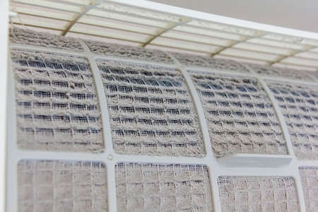 air conditioner cover was removed until visible to air filter waiting clear or repair in roomの写真素材