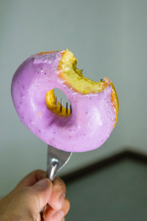 doughnut was fork stab isolated with whith background