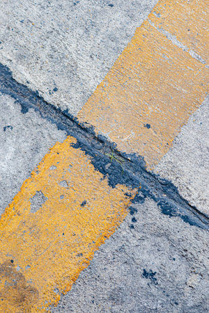 Yellow stripes on the concrete floor, texture background styleの写真素材