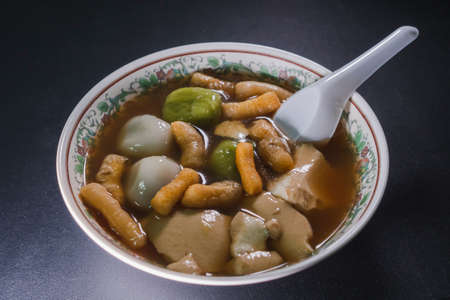 Thai dessert call bua loy make from cassava starch in Ginger Juice under lightingの写真素材