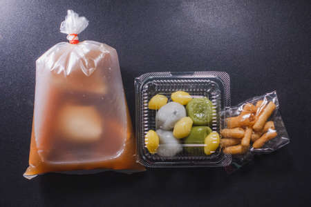 Thai dessert call bua loy make from cassava starch in Ginger Juice under lighting