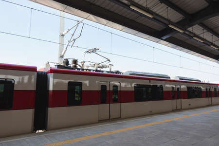 generator on high-speed train is parked in the station waiting to pick up passengers during dayの写真素材