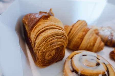 Croissant set in a paper box looks appetizing, inter dessert foodの写真素材