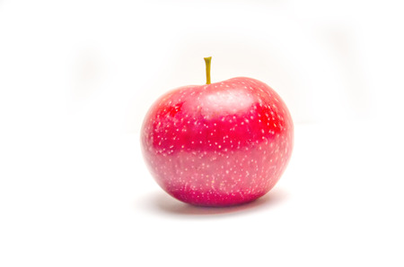 red Apple on white background and shadow under it