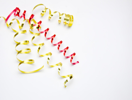 serpentine yellow and red on white background selective focusの写真素材