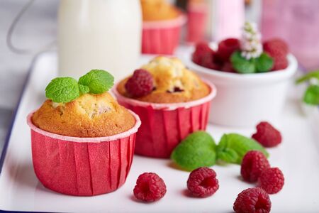 Muffins with raspberries. Delicious homemade sweet dessert. Coffee breakの写真素材