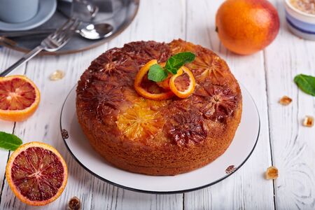 Upside down biscuit cake with caramelized bloody oranges. Delicious homemade dessert.の写真素材