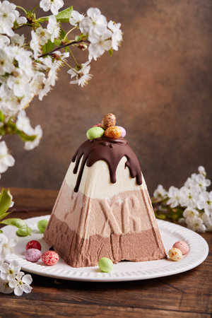 Paskha Cottage cheese traditional Easter dessert with three types of chocolate white, milk and...