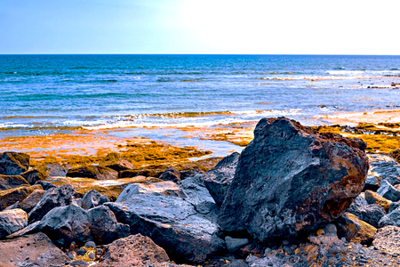 View of the Atlantic coast in Tenerife. Beach, volcanic stones, pebbles. Tenerifeの写真素材