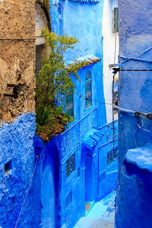 Chefchaouen, a city with blue painted houses. A city with narrow, beautiful, blue streets. Stairs lead down. Chefchaouen, Morocco, Africaの写真素材