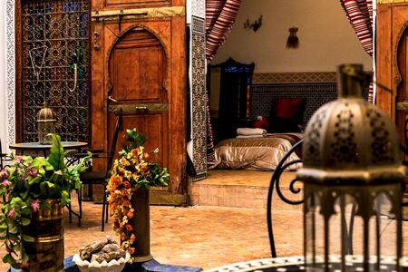 traditional arabic resting place, living room with original lamp, armchair and decoration