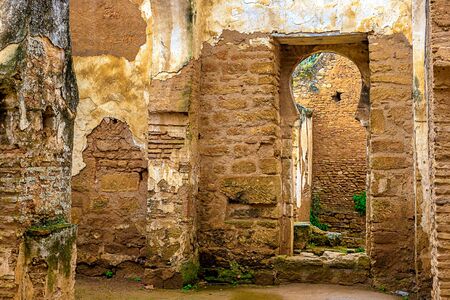 Ruins of the Roman city known as Sala Colonia and the Islamic complex of Chellah, mosque and minaret ruined. Chellah is the necropolis of Rabat. Morocco.の写真素材