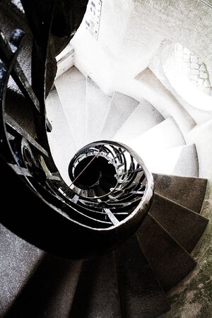 Beautiful image of a spiral staircase, view from the top. Sintra, Portugal.の写真素材