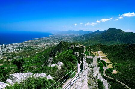 Landscape. View from the top of the mountain to the coastline of North Cyprus and the wall of the Castle of St. Hilarion. Cyprus, the castle of St. Hilarionの写真素材